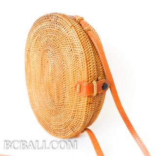 Oval rattan handbag ata hand woven leather handle 